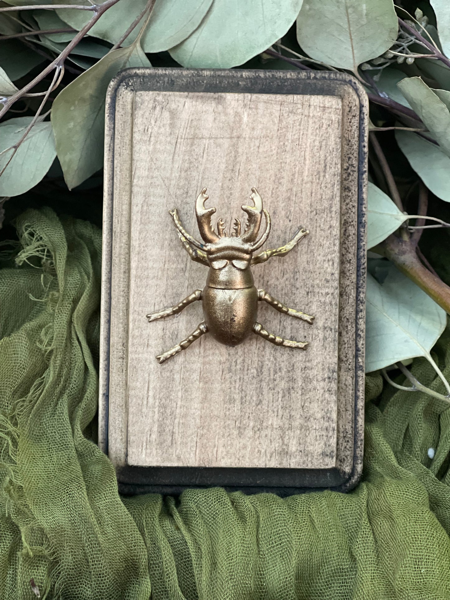 Faux brass insects