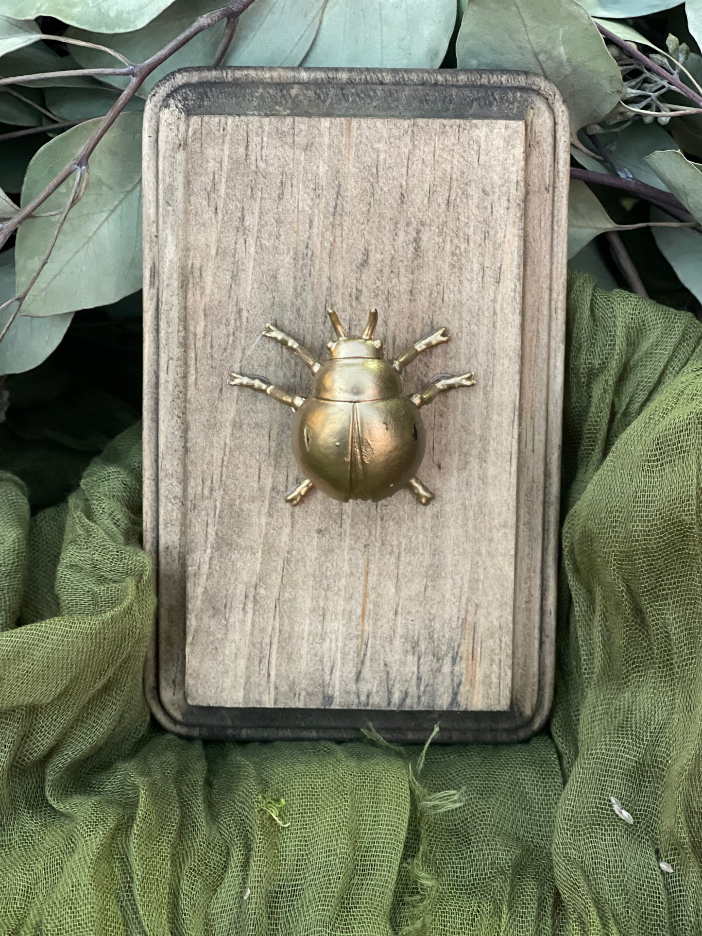 Faux brass insects